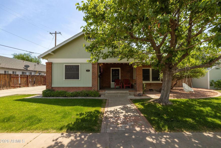 Welcome to this beautifully maintained 3 bedroom, 2 bathroom brick bungalow right in the heart of Phoenix's beloved Coronado Neighborhood. 
From the moment you arrive, you'll be captivated by the lush, beautifully landscaped front yard featuring a thriving sprinkler and irrigation system, stunning mature shade trees, and a sprawling grassy lawn perfect for afternoon picnics beneath the iconic mulberry tree. This is curb appeal at its finest.
A spacious concrete slab driveway provides room for up to 4 vehicles, offering the kind of off-street parking that is truly hard to find in this neighborhood. And speaking of location, this home is walking distance to some of the best local dining and coffee spots the area has to offer, including the beloved neighborhood staple The Main Ingredient, along with charming nearby coffee shops and restaurants that make Coronado one of Phoenix's most vibrant and walkable communities.
Peace of mind comes built into this home. Major systems have been thoughtfully updated, including a roof replacement in 2012, a recently serviced HVAC system, a brand new gas water heater installed in 2025, and all newer water supply lines throughout. The home also features a complete foundation redo, a $40,000 investment, with subflooring replaced and luxury plank vinyl flooring installed throughout. Charming sash hung windows and a proper foyer entry greet you as you step inside, setting an elegant tone from the start.
The kitchen truly is the heart of this home. Fully and recently remodeled, it boasts extended height cabinetry with soft-close hardware, quartz countertops and backsplash, a Franke undermount sink with a new RO system, and a generous eat-in kitchen dining space. All LG stainless steel appliances convey, including a 5-burner gas range with microhood. A pantry with custom shelving adds exceptional storage, while the open layout flows seamlessly into the living room under soaring high ceilings. A dual pane upgraded slider opens to the rear patio, blending indoor and outdoor living beautifully. The stacked washer and dryer are conveniently located inside the kitchen and also convey.
The primary bedroom features a fully upgraded en suite bath, and the guest bath has received the same quality attention. Upgraded baseboards, new ceiling fans throughout, and a fresh coat of paint give the entire home a clean, move-in ready feel.
Step outside to your private backyard retreat, fully enclosed by a brand new block wall perimeter fence that creates a wonderful courtyard-style atmosphere, offering privacy, security, and a true sense of sanctuary right in the heart of the city. A stunning Alumawood pergola, low-maintenance aluminum crafted to look like real wood, anchors the pavered rear patio, perfect for entertaining or unwinding. A pavered side yard, mature pepper trees, and Chinese elm trees complete the outdoor picture, all part of over $17,000 in landscaping and hardscaping upgrades. A large on-site storage shed adds practical convenience to this exceptional outdoor space.
This is a rare opportunity to own a truly turnkey home in one of Phoenix's most sought-after historic neighborhoods, where charm, character, and quality upgrades come together seamlessly. Don't miss it!