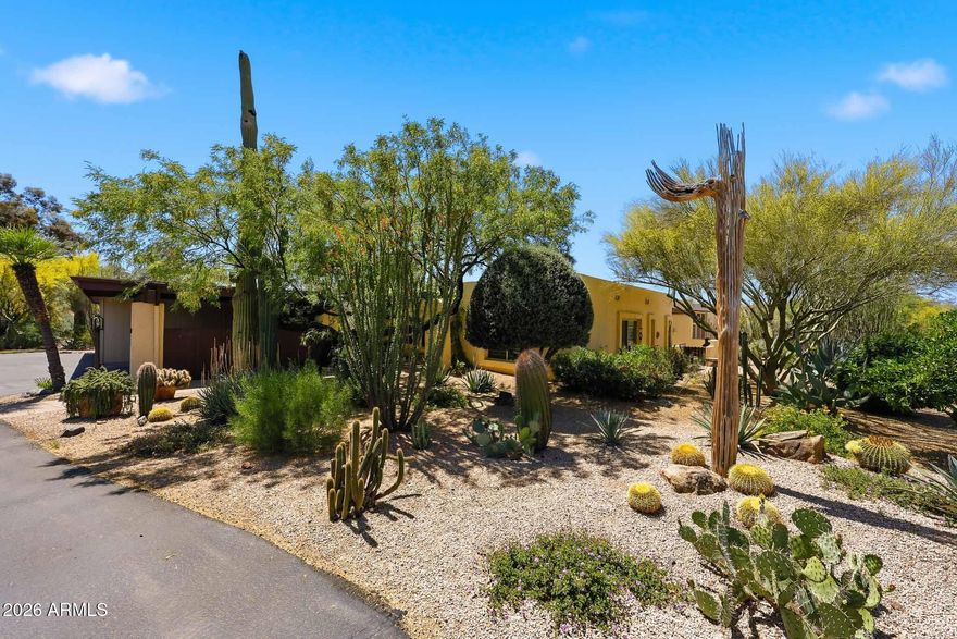 Cave Creek, Arizona. Original & real western southwest. Corner lot. Designed by famous architect Bennie Gonzales. Fully remodeled/updated. For a discriminating buyer only. Outstanding Santa Fe style townhome. Ideal as full-time home or superb vacation rental reminiscent of the Arizona Old West. Ready to go, key-in-hand, fully tastefully furnished, expensive art everywhere, premium custom designer window coverings, W/D, full kitchen everything, w/modern comfort. Quartz countertop & pull-outs. Superbly augmented desert landscaping. Mountain & desert views. New windows. Alarm system, 2-car carport, guest parking, storage cabinet, heated spa & pool a few steps away.  Sunshine & relaxation. Unwind each night w/sunset dinners and stargazing under dark desert skies. Can you handle all that? Inspiring, tranquility & calm awaits. Inspiring, tranquility & calm awaits. Sunshine & relaxation. Start your day w/ coffee on the patio, then explore saguaro-lined paths, golf courses, hiking trails, lots of fun local dining, Cave Creek downtown hanging out.