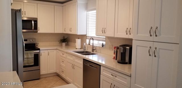 9647 E PALOMINO Place