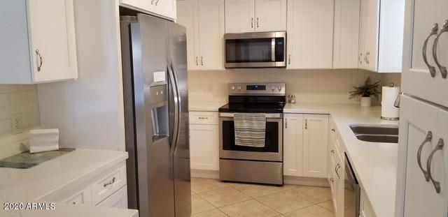 9647 E PALOMINO Place