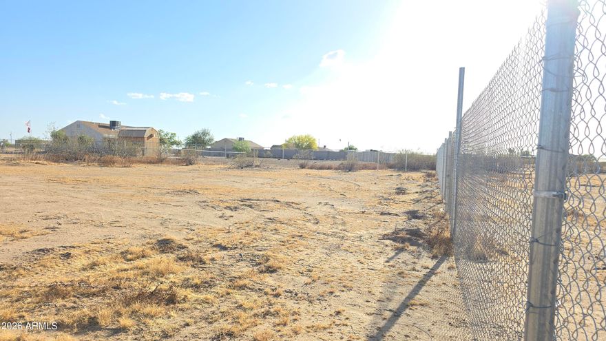 No HOA & Over 1 Acre! This fenced corner lot is a rare find in one of the area's fastest-growing locations. Shared well and electricity are underway. Whether you're looking to invest or build your dream home, this property is full of potential. With quick access to Highway 60, you get the perfect mix of space and convenience. Opportunities like this don't come around often. Don't miss out, come explore the possibilities!