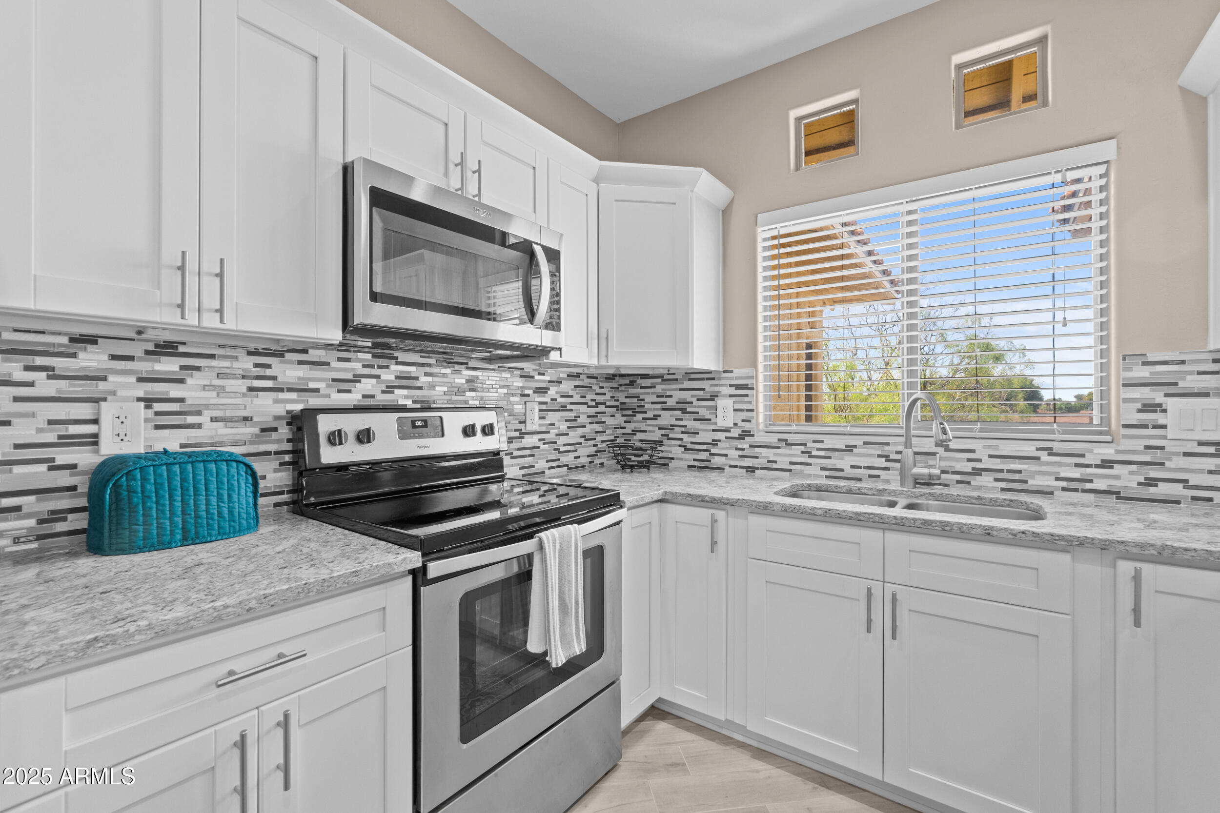 9100 E RAINTREE Drive 239
