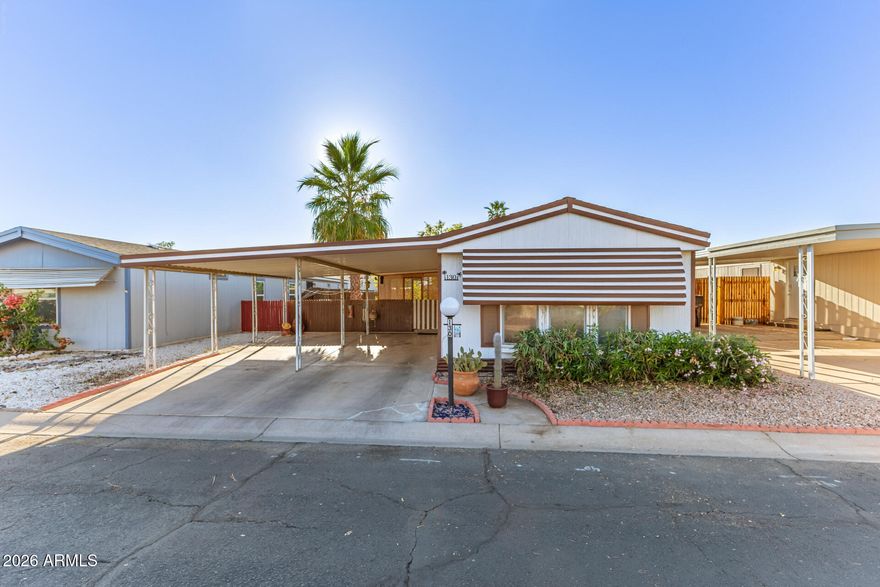 Welcome to this well maintained 3 bedroom , 2 bath manufactured home in the desirable Peoria Polynesian All Ages Community! This home features newer flooring, and indoor laundry room, and three newer mini-split systems for added comfort and efficiency. Major updates include a new roof (2024) and a new water heater (2025), giving peace of mind to the next owner. Enjoy covered parking and a low maintenance outdoor space. Community amenities include a pool, clubhouse, and onsite laundry. Conveniently located near shopping, dining and freeway access- don't miss this opportunity!