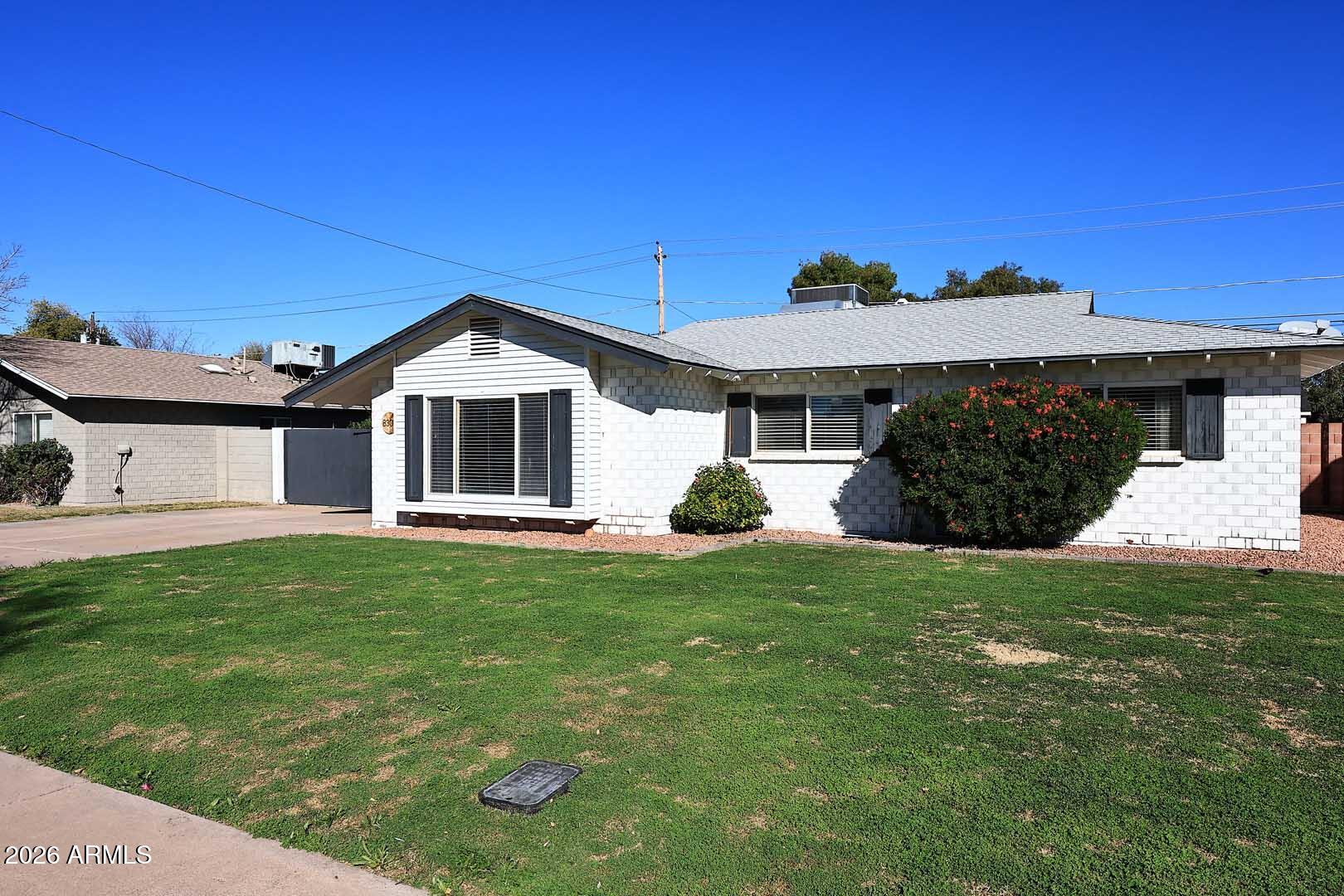 8302 E INDIANOLA Avenue