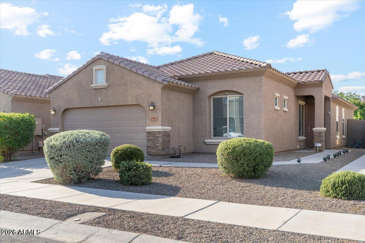 6748 W CHARTER OAK Road