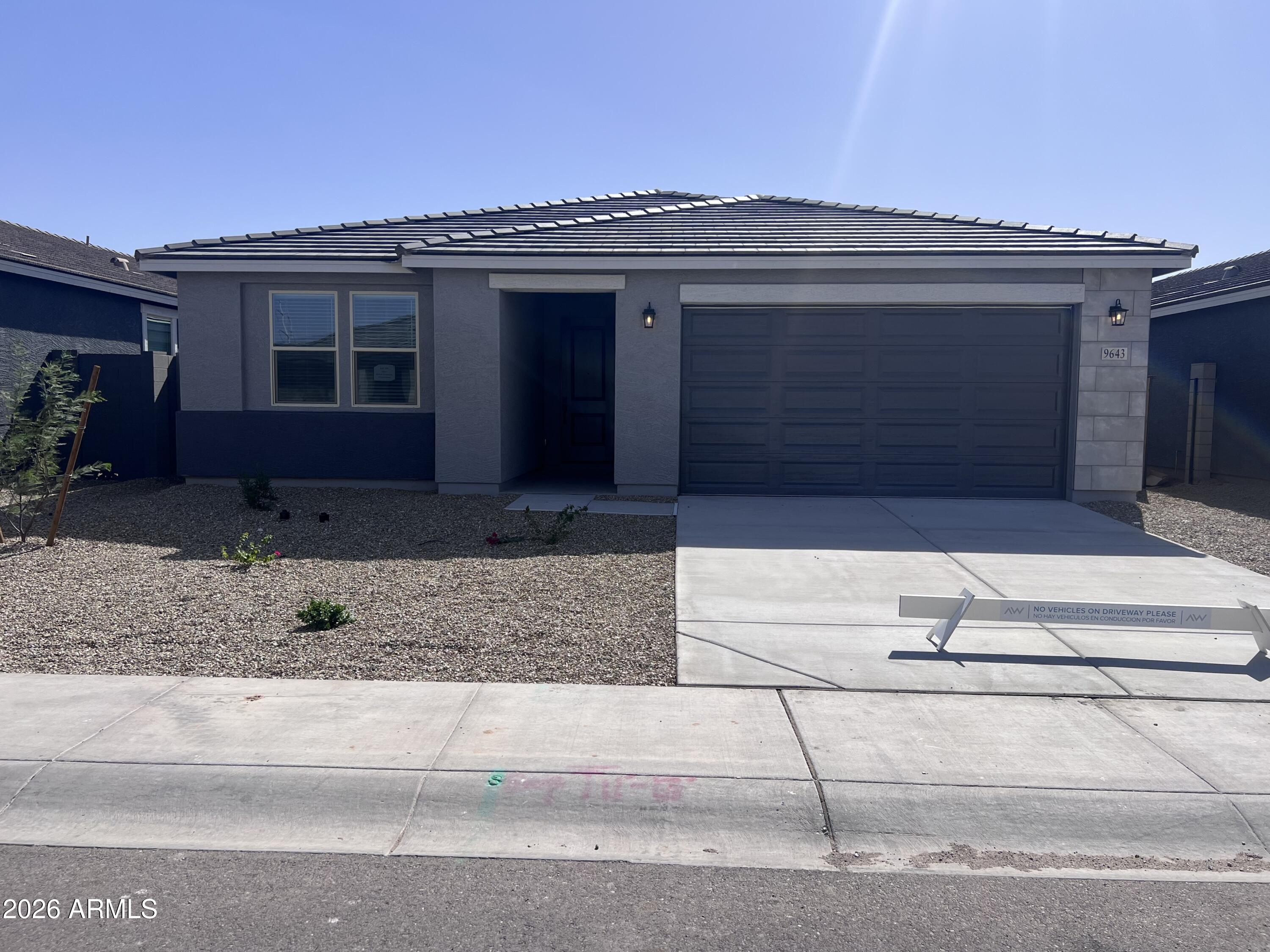 9643 W TAMARISK Avenue