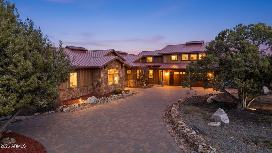 Discover exceptional luxury in this custom 3,877 sq. ft. retreat at Talking Rock Ranch. This 3-bedroom, 4-bath home features a spacious ''Live on One Level'' design highlighted by Australian Cypress floors, vaulted tongue-and-groove ceilings, and knotty alder finishes. The chef's kitchen is equipped with GE Profile appliances and granite counters. Enjoy panoramic Granite Mountain and valley views from the wraparound deck. Modern upgrades include owned water heater solar, newer HVAC units, and a Control4 system. Includes a versatile bonus room above the garage. Located walking distance to the private clubhouse, fitness center, and golf course. Gated security and a wellness-focused lifestyle await in this impeccably maintained estate.