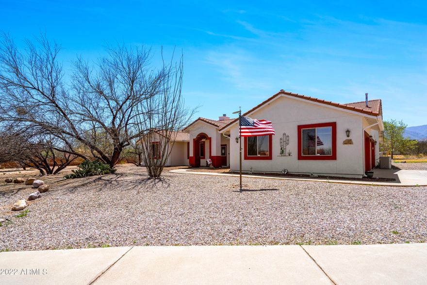 Stop your search... this house is a beautiful 4 bedrooms, 3 bathrooms. BONUS TWO rooms as you walk in can be used for office, den, library, sitting room so many possibilities. Split floor plan allows for great situation for all types of living. This 2700+ sq foot home is grand with its high ceilings and spacious living areas and rooms. Master bedroom is extra large with a walk in closet. Enjoy the weather southern AZ provides imagine it on your private patio over looking your unobstructed mountain views. Located in the highly desired Mountain Shadows subdivision.