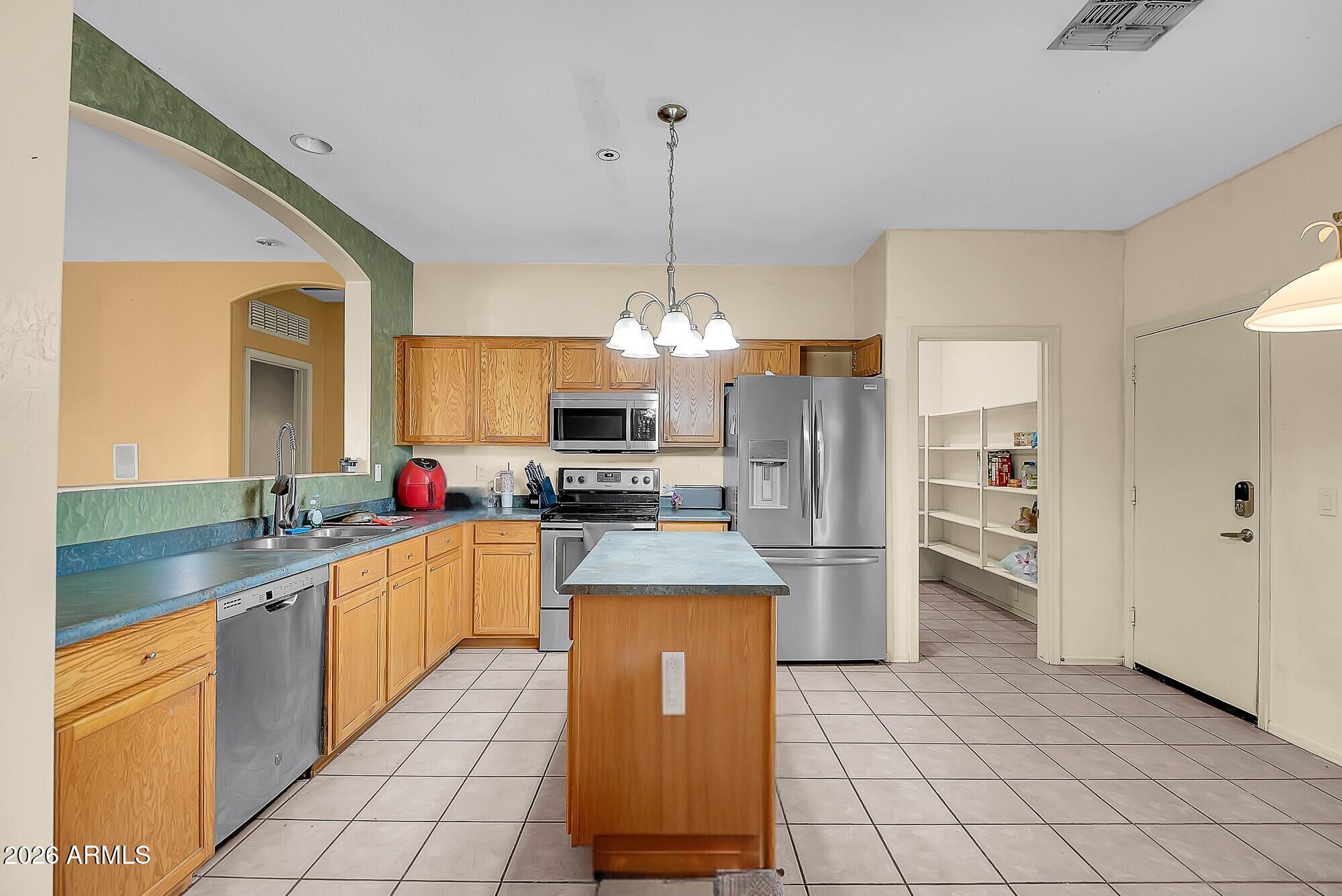 12109 W VALENTINE Avenue