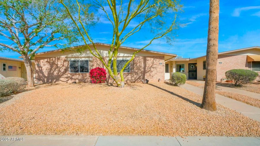 Discover maintenance-free living,, move-in ready 2-bed, 2-bath home on W Prospect Drive in Sun City West's premier 55+ community. This rare residence features an open floor plan with a large kitchen island, breakfast nook, dedicated dining area, spacious living room, and in-home laundry. Outside, enjoy easy-care zero-scaping, a generous private patio, and an attached one-car enclosed garage with off-street parking, plus ample on-street parking for guests. Residents enjoy access to golf courses, pools, community centers, scenic walking paths, and convenient golf-cart travel throughout the community. Beautifully maintained and offered, this home is truly a must-see.