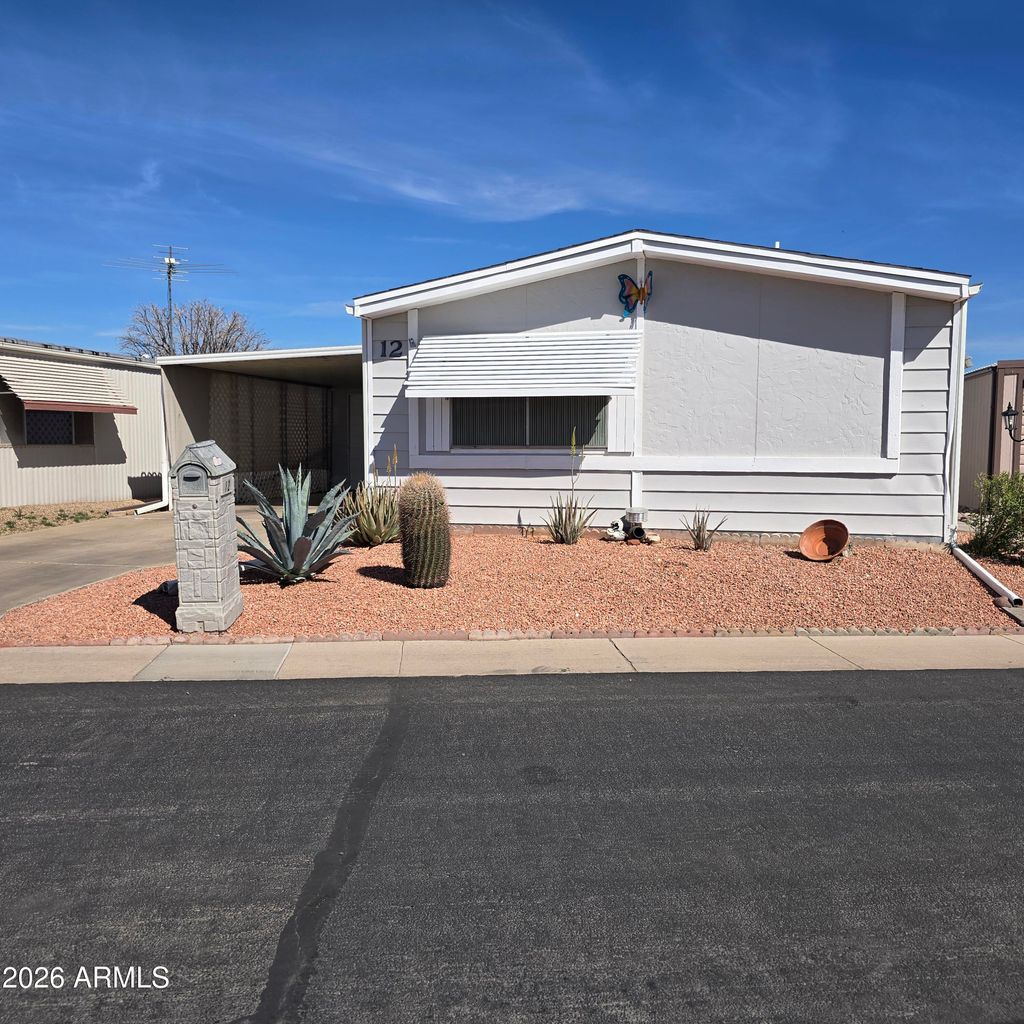 Photo of 10201 N 99th Avenue #12, Peoria, AZ 85345 (MLS # 6999131)
