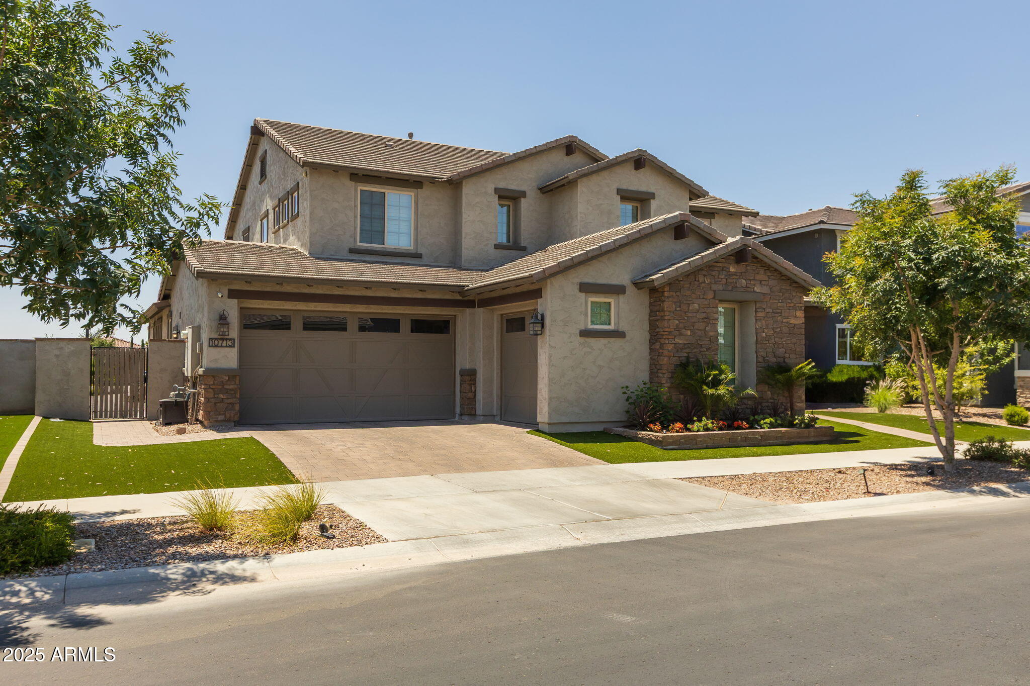 10713 E TESLA Avenue