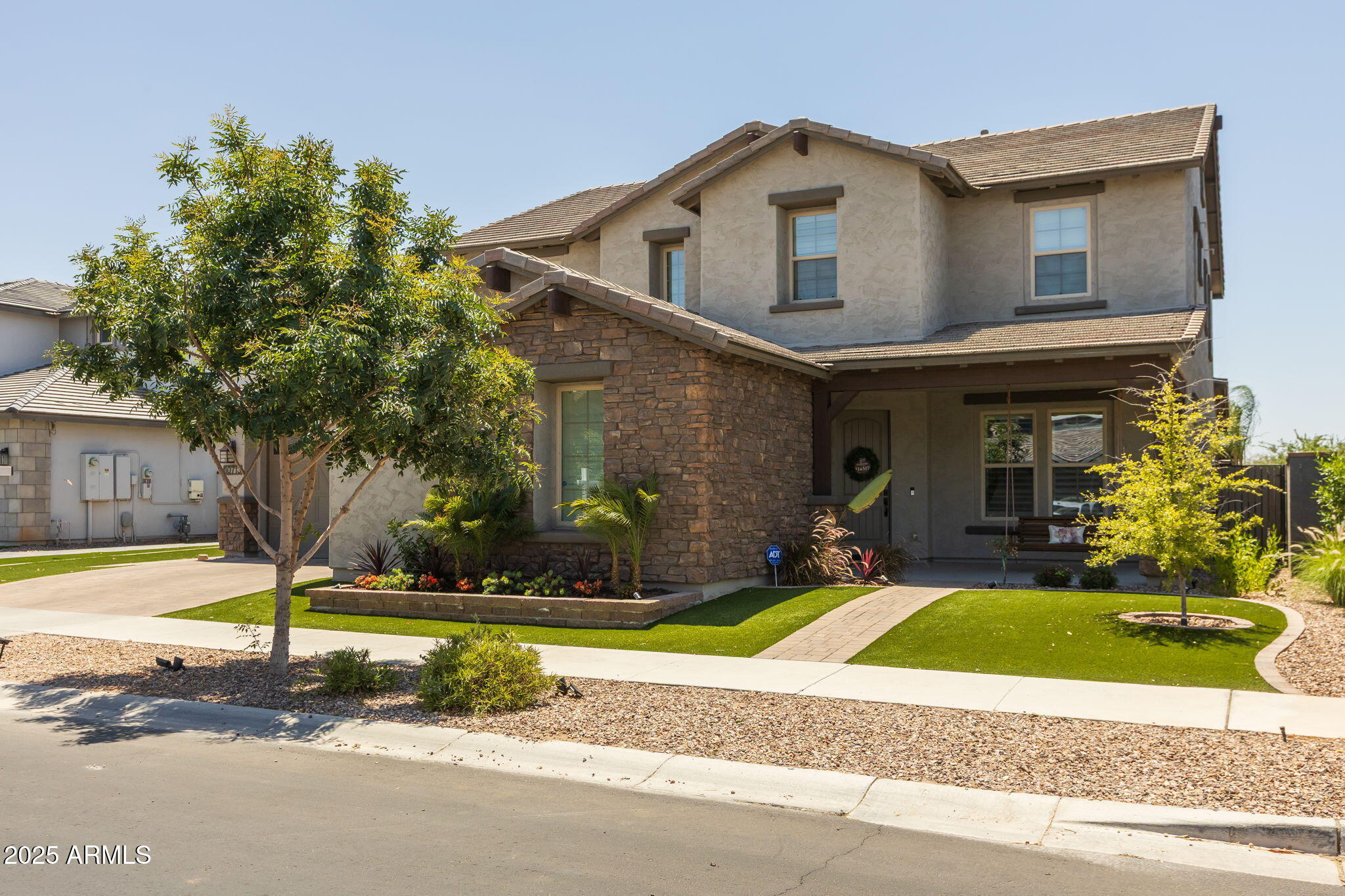 10713 E TESLA Avenue