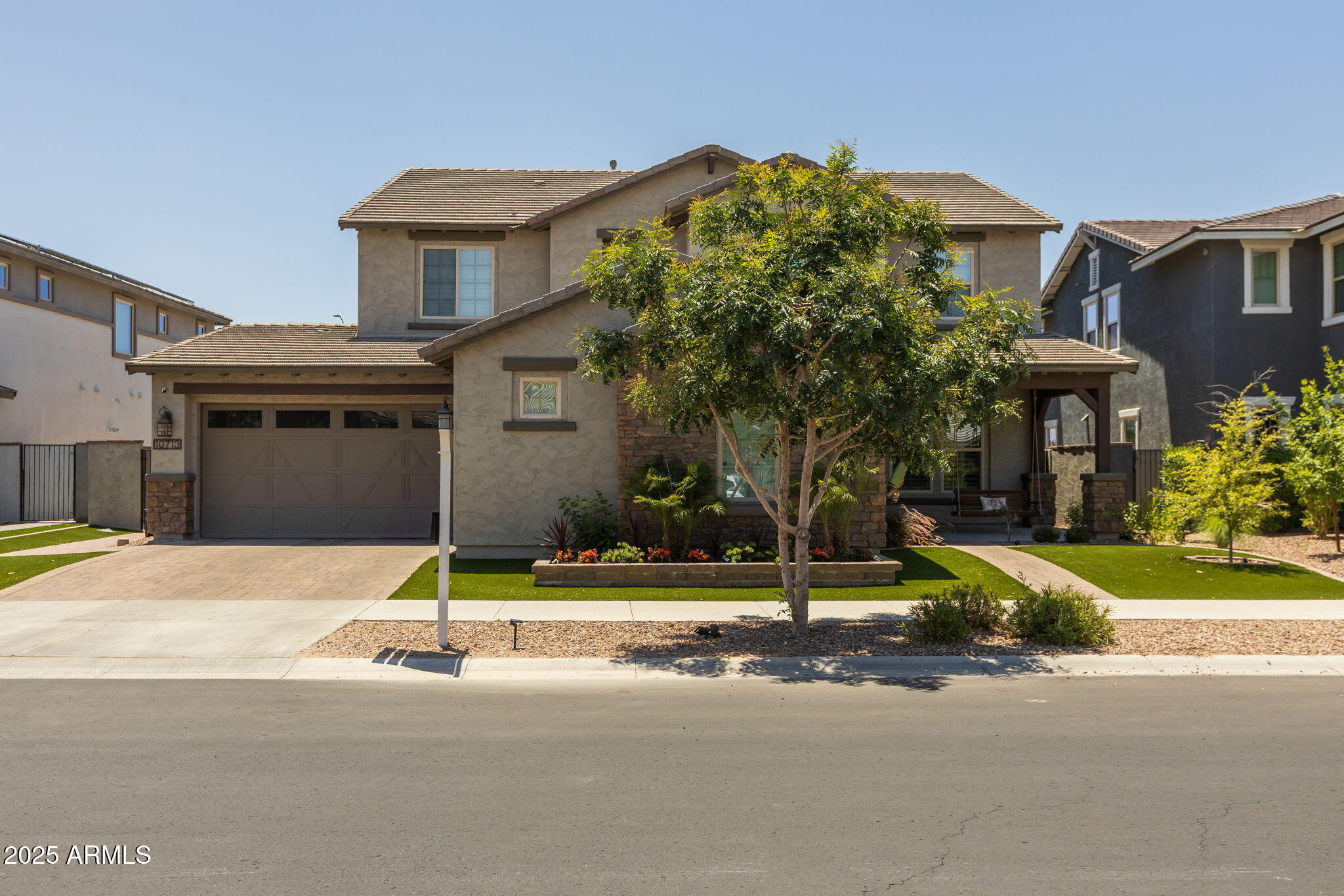 10713 E TESLA Avenue