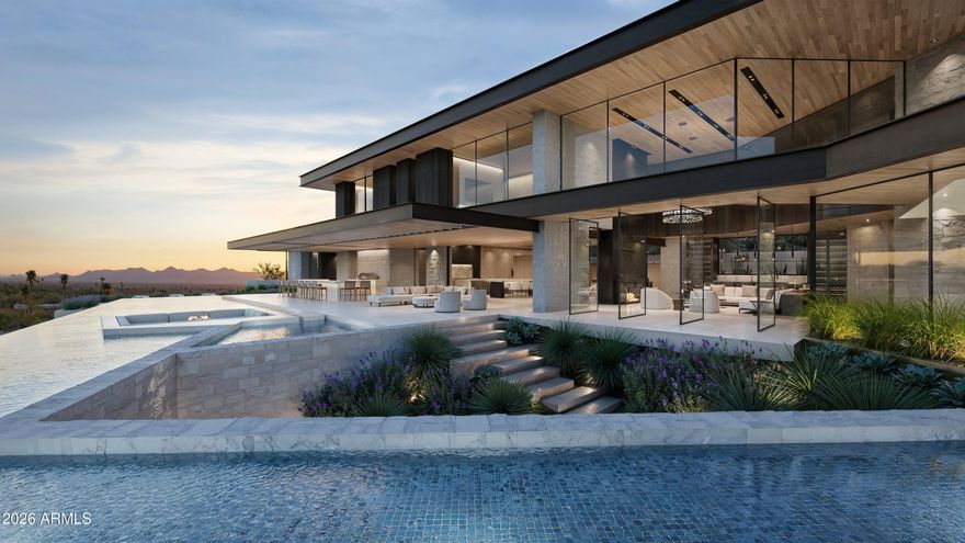 Set high on the prestigious north side of Camelback Mountain, this newly constructed architectural estate captures some of the most breathtaking views in all of Paradise Valley. Positioned on an elevated 1.8 acre homesite, the property overlooks sweeping vistas of the McDowell Mountains, Pinnacle Peak, and the sparkling city lights stretching across the Valley. Designed by renowned architect Stratton Andrews with interiors by acclaimed designer Holly Wright, the residence blends modern desert architecture with warm, refined finishes. The home is thoughtfully designed to frame the surrounding landscape through walls of glass and expansive outdoor living spaces. Spanning approximately 9,000 square feet of livable space with additional lower-level flex areas, the floor plan offers an exceptional balance of grand entertaining and private retreat. The main living areas feature dramatic ceiling heights, a stunning great room, formal dining, a chef's kitchen with secondary prep spaces, wine storage, and seamless indoor-outdoor flow to the resort style pool and spa overlooking the valley below. The lower level is designed for lifestyle and entertainment, featuring a private gallery space, golf simulator, gym, lounge areas, and additional storage. Upstairs guest suites are positioned to capture mountain views while maintaining privacy for both owners and guests. Outdoor amenities include expansive terraces, fire features, multiple entertaining areas, and an infinity-edge pool that visually connects the home to the surrounding desert landscape. A spacious four-car garage, elevator, and thoughtfully integrated smart home features complete the residence. This is a rare opportunity to own a newly built architectural showpiece on one of the most iconic view lots on Camelback Mountain.