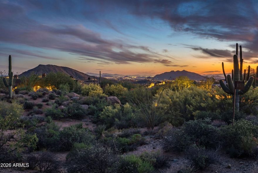One of Desert Mountain's finest remaining homesites located in the premier village of Saguaro Forest. Over an acre site, located along the 17th hole of Chiricahua, this site has a building envelope of approximately 21,748SF. This lot features, golf course, surrounding mountain, sunset and city light views! Lush Sonoran Desert vegetation and onsite granite boulders add charm. This site begs for a dream home with striking architectural vision. The views during the day are spectacular, but the drama unfolds as the sun goes down with sunset colors in all directions, shadows casted on saguaro studded hills, and mountain silhouettes come alive! Combine with adjacent Lot 153 for combo ''Trophy'' Site ! Bike or hike from your home to the nearby Desert Mountain Trails with over 20 miles of multi-us trails. Chiricahua and Cochise Geronimo Clubhouses are nearby for quick access to dining and golf. The Sonoran Fitness Center's state-of-the-art fitness facility is a short drive away. Inquire for building envelope and to meet onsite.