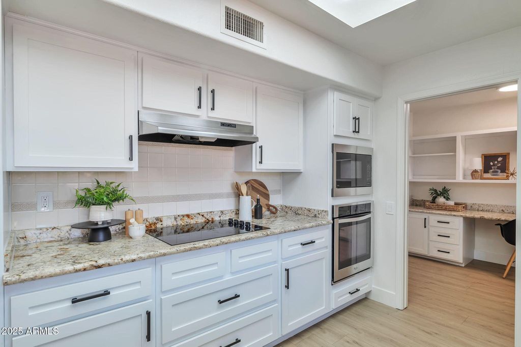 Photo of 15116 W Sentinel Drive, Sun City West, AZ 85375 (MLS # 6957426)