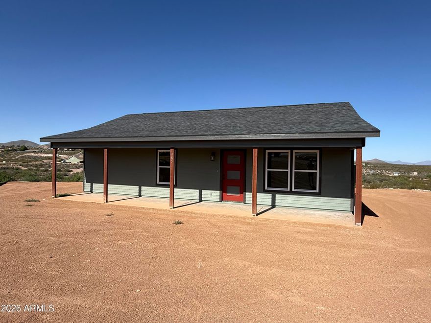 Brand new build in the old west! Come check out this new build in the Town Too Tough to Die, just minutes away from the action of Allen st. This home sits upon a stunning view lot that looks over the valley below and surrounding mountains. This home was built with top notch materials and quality craftsmanship. Step inside this home and notice the high 9' ceilings, butcher block breakfast bar and granite counter tops. Kitchen is bright and airy with all of the essentials. Master bedroom is large and has a sliding glass door out to the stamped concrete covered patio. Master bath has dual vanity with large tiled, walk in shower. Walk in closet is spacious and bright with room for all of your apparel. Laundry area inside which is well lit and has top cupboards for your supplies. Guest bedroom is spacious and bright with large closet and heated with its own mini split for heating and cooling. Guest bath is open with tiled shower and glass doors. This home is heated and cooled with high efficiency mini splits in every room. This allows the owner comfort while not having a whole house HVAC system. You can heat and cool each room independently. Floors are LVP throughout with a gray/wood coloring which makes them aesthetically pleasing and easy to maintain. LED lighting in the rooms and bathrooms, ceiling fans as well. City provided water and brand new septic systems. This is worry free living at its finest.