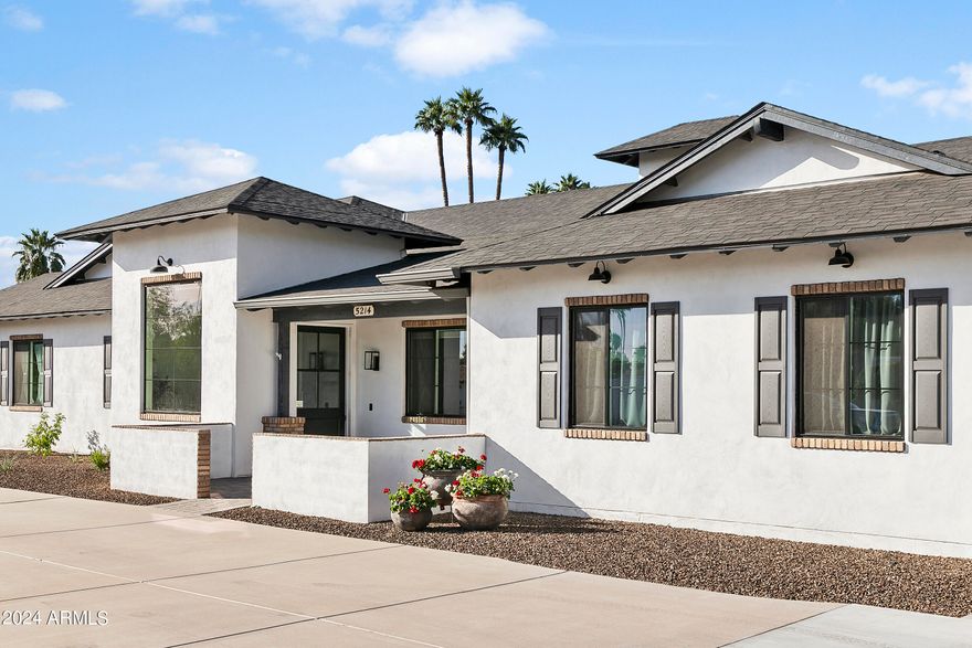 Discover your private desert retreat in the heart of Arcadia! This contemporary ranch estate, built in 2018, offers a combined 5,582 SqFt of luxury living between the 4,413 SqFt main house and a spacious 1,169 SqFt guest house. This stunning home features an open floor plan with soaring ceilings and sun-drenched spaces. The gourmet kitchen is a chef's dream, complete with a massive island, double ovens, a 66-inch fridge/freezer, and an oversized pantry for all your storage needs. Perfect for entertaining, the kitchen flows effortlessly into the main living area, creating an inviting space for gatherings. The primary suite is a true sanctuary, offering a spa-like bathroom, a large walk-in closet, and direct access to a private patio where you can soak in the stunning views of Camelback.