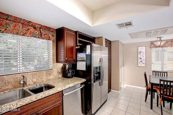 9735 N 94TH Place 209