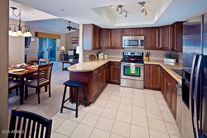 9735 N 94TH Place 209