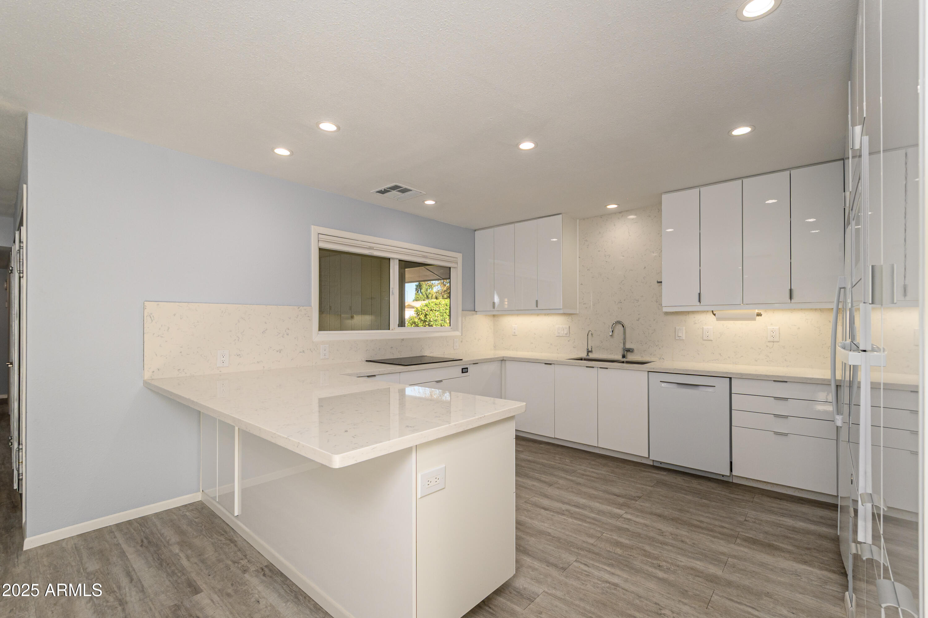 12727 W MAPLEWOOD Drive