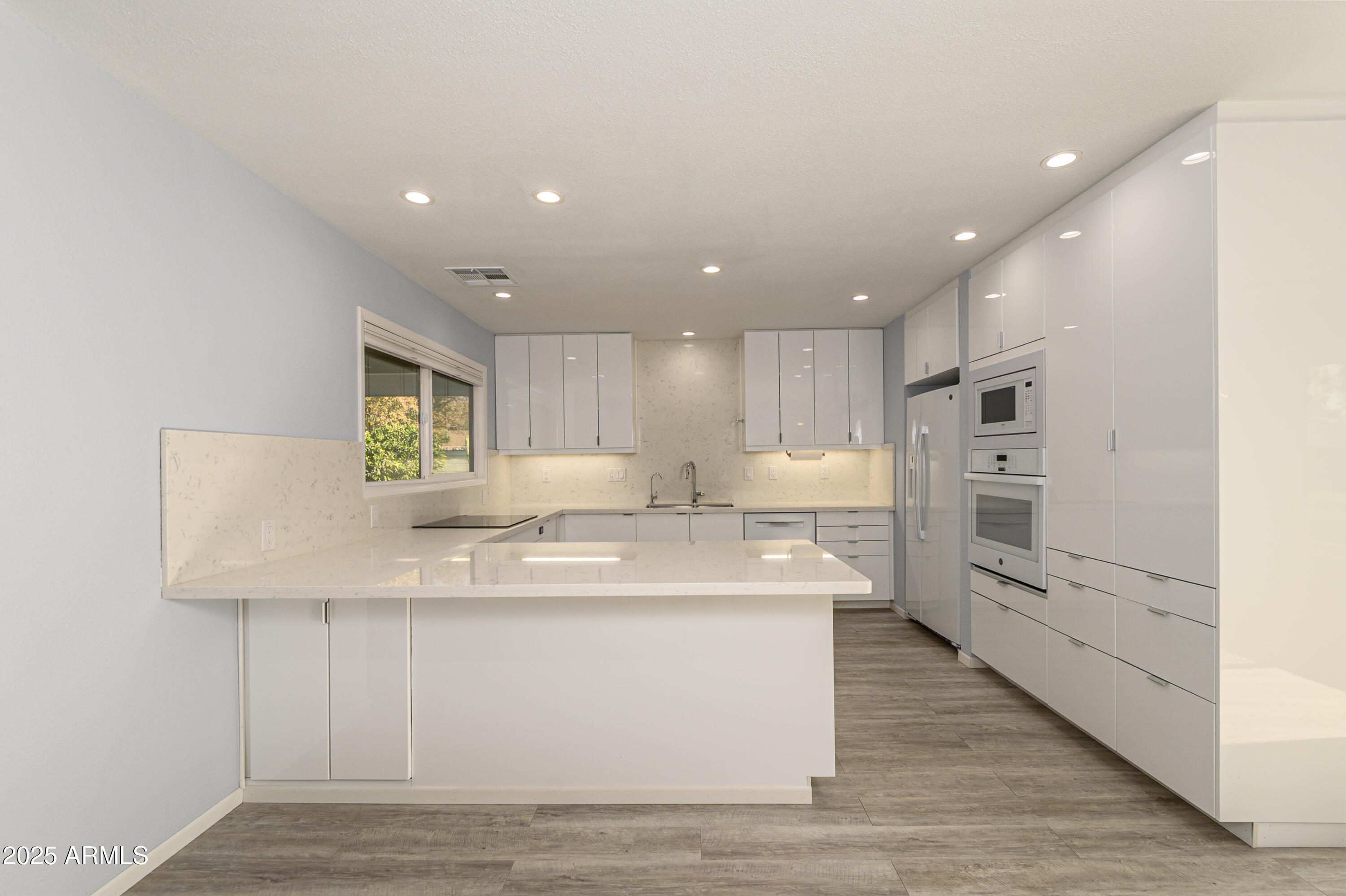 12727 W MAPLEWOOD Drive