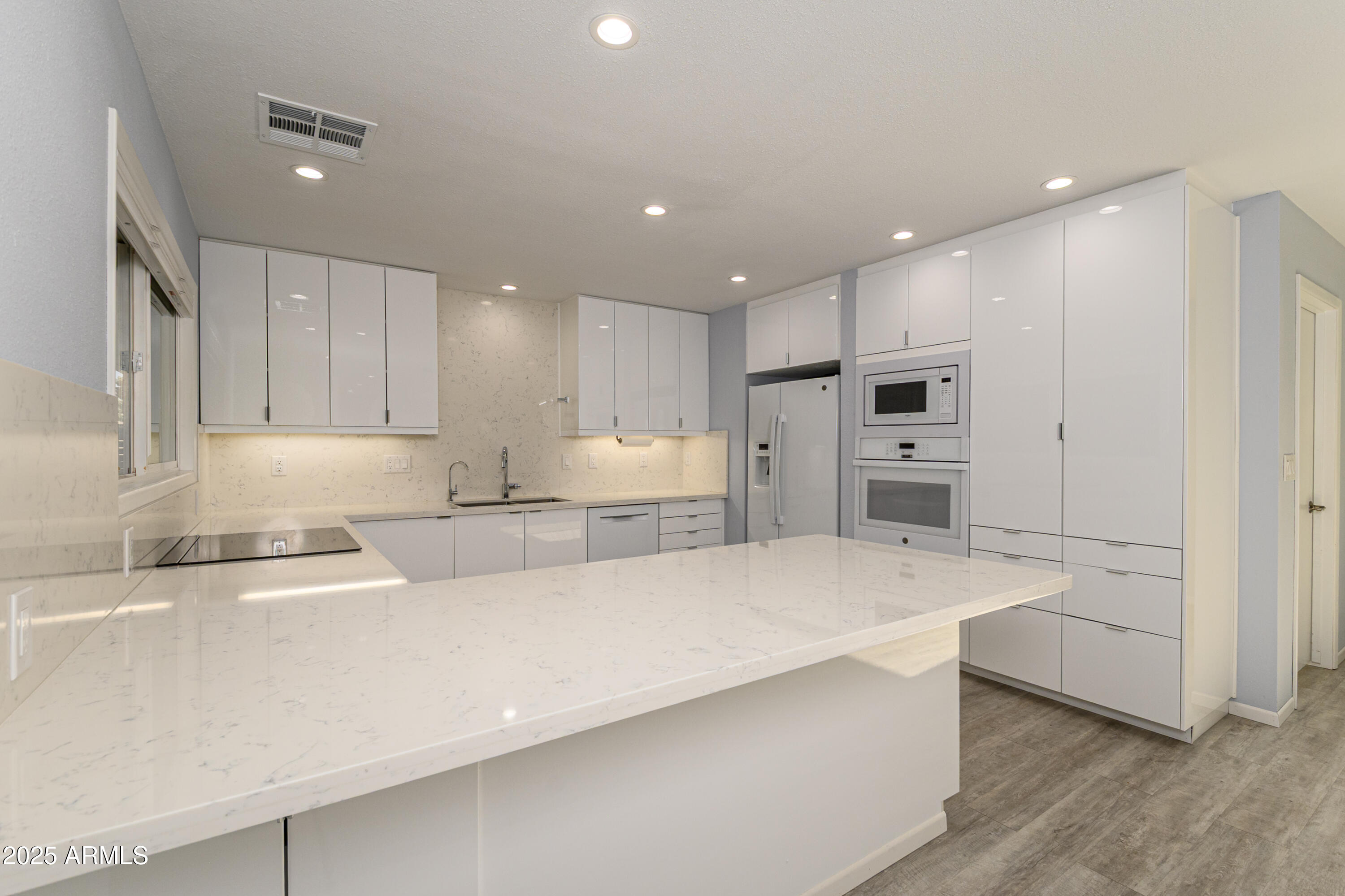 12727 W MAPLEWOOD Drive