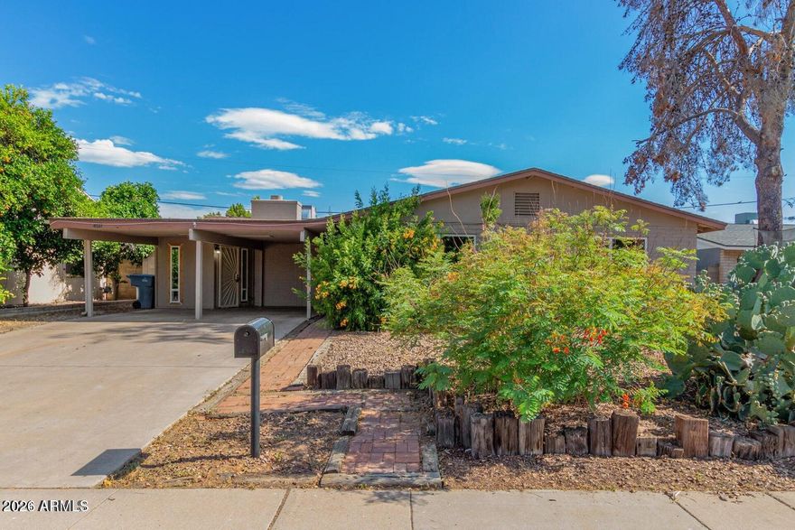4137 W Frier Dr, Phoenix, AZ 85051, is a spacious single-family home with 3 bedrooms, 2 bathrooms, and 2,399 sq. ft. of living space on a 6,207 sq. ft. lot. Built in 1968, it features an Arizona room, family room, breakfast room, dual-pane windows, tile floors, and a fireplace. The kitchen is equipped with an electric cooktop, dishwasher, and refrigerator. The backyard boasts a private fenced pool, and a storage shed. For additional comfort and convenience there is a two-space carport with extended driveway, central A/C, forced air heating, and side gates on both sides of the home with a north/south exposure. All within walking distance to all three levels of schooling.