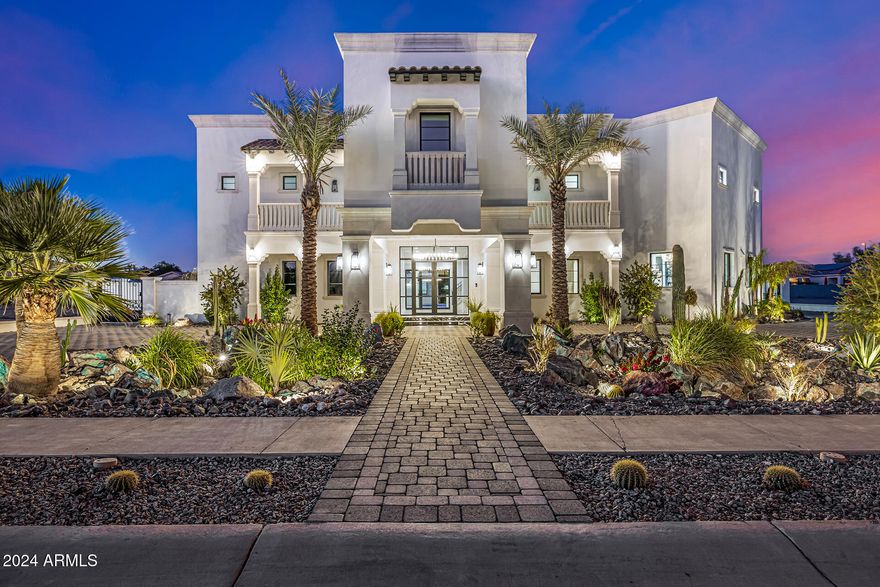 WINNER of the 2026 ICF Builder award!  This incredible custom home on a cul-de-sac in Gilbert offers over 10,000sf of luxury living space in the main home plus a 899sf casita featuring six bedrooms and nine bathrooms. Thoughtfully designed with every detail in mind, this property has a theater room, game room, and multiple flex spaces to cater to any lifestyle. The property includes a detached Casita, a sparkling pool, and was built with ICF blocks, ensuring exceptional energy efficiency..... This incredible custom home on a cul-de-sac in Gilbert offers nearly 8,000 square feet of luxury living space, featuring six bedrooms and nine bathrooms. Thoughtfully designed with every detail in mind, this property has a theater room, game room, and multiple flex spaces to cater to any lifestyle. The property includes a detached Casita, a sparkling pool, and was built with ICF blocks, ensuring exceptional energy efficiency.

As you approach through the custom gates, you're welcomed by a circular paver driveway, setting a grand tone. The entertainer's kitchen boasts dual walk-in pantries, marble and quartz slab countertops, three sinks, a 48-inch Wolf range with double ovens, two dishwashers, a Sub-Zero fridge and freezer, a Scotsman ice maker, and beverage fridge. This open-concept kitchen flows into the family room, overlooking the stunning pool.

Enjoy the latest in smart home technology with Control4 integration for the doorbell, garage, thermostats, and more. Each bathroom is adorned with high-end faucets, hardware w/ marble and quartz finishes. All bedrooms feature en-suite bathrooms with soaking tubs and luxurious finishes throughout. Outside, a heated pool with a rainfall feature, suspended lounge beds, and a built-in BBQ complete this impressive backyard.

This property also includes a six-car garage, an elevator, an exercise room, and ample space for any family size.