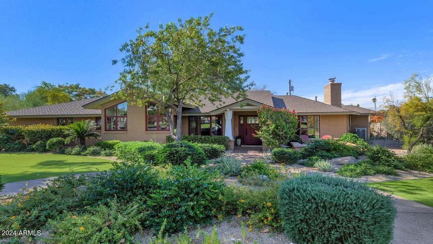 This sprawling Arcadia ranch is just lovely. The floor plan flows perfectly and includes a large island kitchen with plenty of space to prep, serve and entertain, a beautiful formal dining room, a fantastic great room and family room both overflowing with natural sunlight, private office, super cool Arizona room, and even a guest house. This home is perfect for a family of any size with four large bedrooms and four bathrooms, and the layout makes perfect use of the space making the home seem much larger than the square footage suggests. This immaculate residence sits on a huge corner lot with magnificent mountain views. Surrounded by multi-million dollars mansions, this is a phenomenal opportunity!