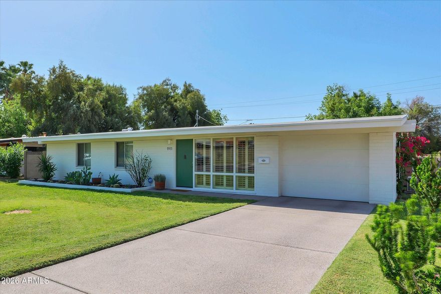 Attention Midcentury Modern fans: This meticulously maintained and thoughtfully updated 3 bed, 2 bath Ralph Haver home is offered for only the third time since 1952. Ideally located in the coveted Biltmore area, this architectural gem blends timeless design with modern upgrades, including a renovated kitchen and baths, updated windows, electrical, roof, and plumbing (see Documents tab). Set on a rare 9,340 sq ft north-facing irrigated lot, the property offers exceptional flexibility, whether you envision expanding the home or adding a backyard ADU. A one-car garage with workshop and EV charging adds everyday convenience.  Rare chance to own a true MCM home that honors its original design. No HOA for freedom and flexibility.