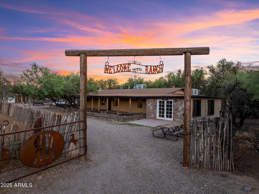 Welcome to The Ranch! This fantastic property was used as a guest ranch and is ready for its new owners. The property comprises three separate parcels totaling 29.96 acres. It features a main home with two bedrooms, two bathrooms, and a large bonus room they use as the dining hall for guests, a second home with two bedrooms and one bathroom, a bunkhouse, and a Cabin (considering leaving with the right offer). It also has a large tack room, tool shed, bonus room, covered hay barn, chicken coop, a large round pen, smaller round pen, five large turn outs, stalls, arena, three wells (one on each parcel), 4 RV hook ups, owned propane tanks, high grade generator, 10 acres of vacant land with old growth mesquite trees, 360 degree million dollar views, and so much more!
The property is zoned commercial, so it is ready for any business you bring to it! The owner has 9 years left of a 10-year exclusive trail riding lease on the State Trust Land and will transfer the permit to the next owner. This location is about 20 minutes from Benson, less than an hour to Tombstone, an hour and 20 minutes from Bisbee, and about an hour to Tucson!
Whether you want it for a family homestead, a guest ranch, a sanctuary, or to run a livestock operation, you'll enjoy having this property for generations to come.
**The all-inclusive guest ranch was very successful and was rated #1 on TripAdvisor.