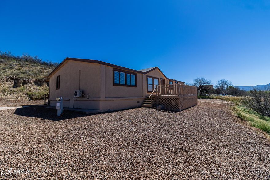 Welcome to your beautifully updated retreat in the heart of Camp Verde! This spacious 4-bedroom home offers the perfect blend of comfort, functionality, and  natural surroundings.

Enter inside to discover recent updates throughout, creating a fresh and inviting living space ideal for both relaxing and entertaining. With four generously sized bedrooms, there's plenty of room for family, guests, or a home office setup. Enjoy wide-open skies and stunning mountain views that provide a peaceful backdrop to everyday living. With horses allowed, this property is perfect for equestrian enthusiasts or anyone seeking a little extra space and freedom. Whether you're looking for a full-time residence or a serene getaway, this property delivers the best of rural Arizona living--modern updates and room to roam.

Don't miss your chance to own a slice of Camp Verde paradise!