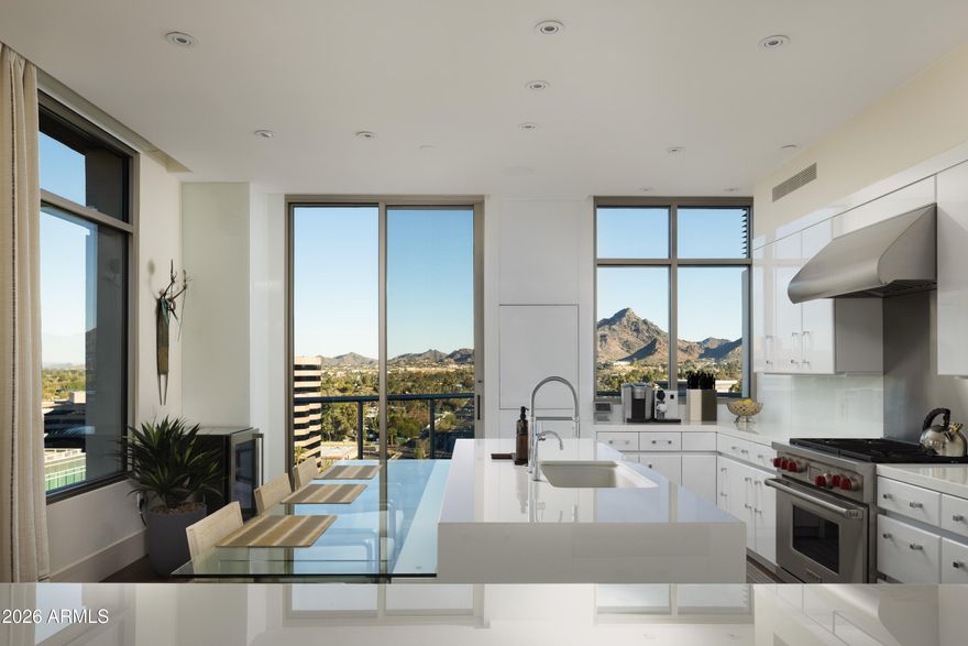 The crown jewel of the ultra luxurious Esplanade Place, Penthouse 1 is the only penthouse unit to capture views of Downtown, Camelback, and Piestewa Peak. Remodeled in 2021, this designer touched masterpiece brings an eloquent, timeless styling of contemporary throughout its spacious 3,350 sq ft floor plan. The chef's kitchen features a gas Wolf cooktop, island, and Sub Zero fridge. Esplanade Place features 24/7 concierge services, valet, workout room, locker rooms with steam saunas, rooftop pool, and more, providing its residents with peak convenience and security.  Walking distance to Biltmore Fashion Park, this penthouse provides easy access to some of Phoenix's best shopping and dining. Just 8 miles from Sky Arbor, living at Esplanade creates easy travelling for its residents.