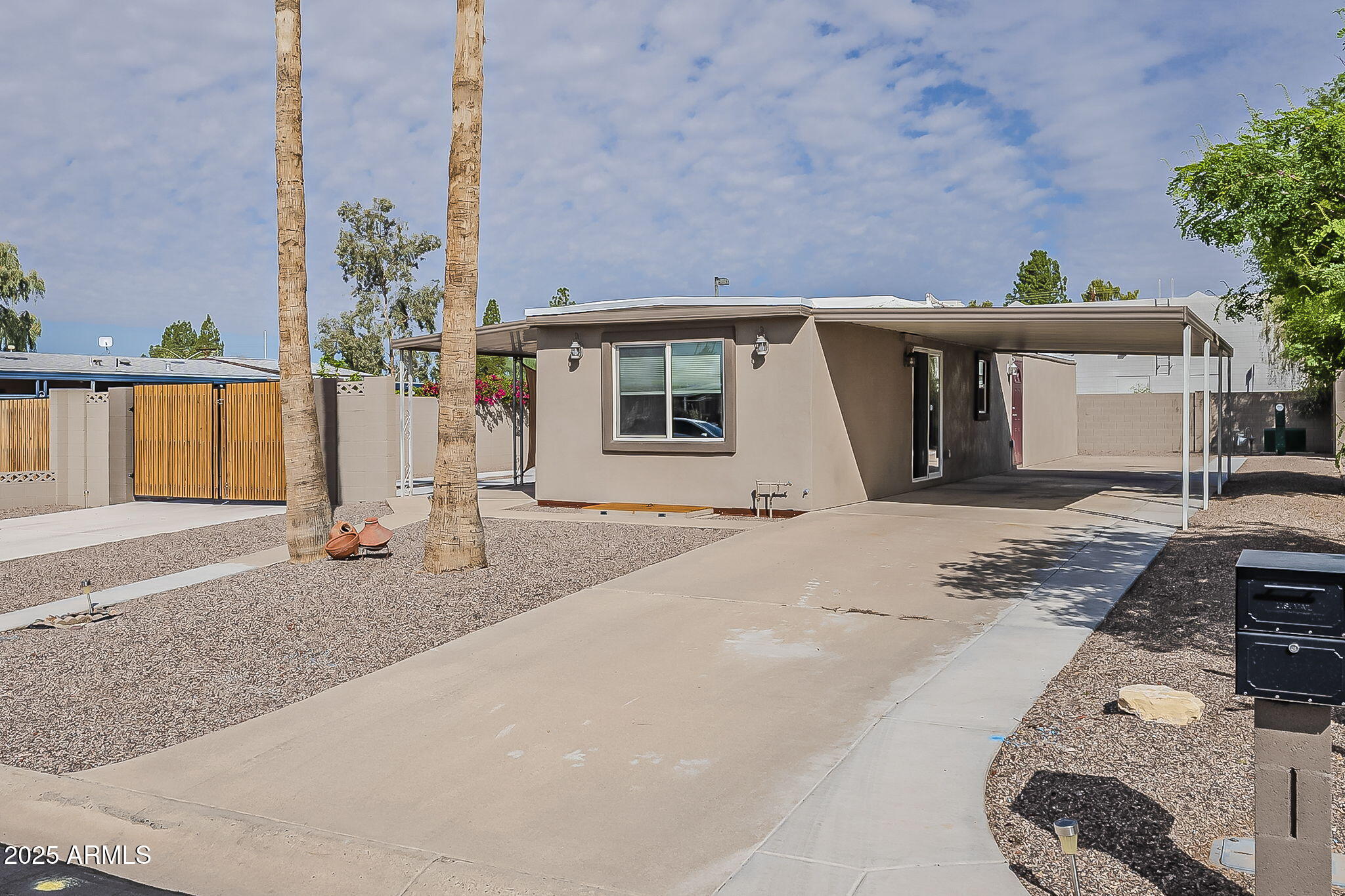 7302 E ABILENE Avenue