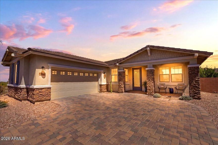 This single-story corner lot home in gated Dove Mountain offers 1,896 sq ft of comfortable living with 2 bedrooms, 2 bathrooms and a private den. Built in 2016 by Mattamy Homes with direct Tortolita Mountain views from the covered patio and desert landscaping with landscape lighting front and back. The kitchen features a gas range, granite counters, island, pantry and refrigerator. The primary suite includes a separate shower, soaking tub and double vanity. Washer, dryer and owned water softener are included. Dual pane windows throughout, tile roof and a 2-car garage. Steps from Dove Mountain Park West with a dog park and pickleball courts, and minutes to 3 championship courses at The Golf Club at Dove Mountain. Move-in ready