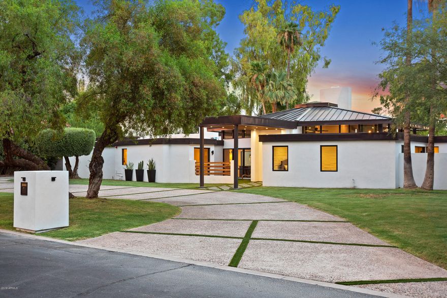 No expense was spared as owners were building for themselves, new infinity pool with baja shelf, 8 western windows opening to the dramatic entertainers backyard . Frank Lloyd Wright style architecturally interesting non right angles preserved. All flat faced solid core cabinets built in the home for the home. Custom Mele built in fridge and dishwasher, custom Modern 48'' viking range, hibachi, purist gold/ brushed brass kohler fixtures, soapstone and artic white quartz waterfall counters throughout. Subzero custom wine fridge, lift/ tesla ready garage, Metal roof, zebra wood custom hood and touches throughout, 48'' herringbone lay tile and double laundry room/ guest wing. Low care with turf and desert vegetation, custom outdoor lighting and efficient insulation make this a golfers dream!