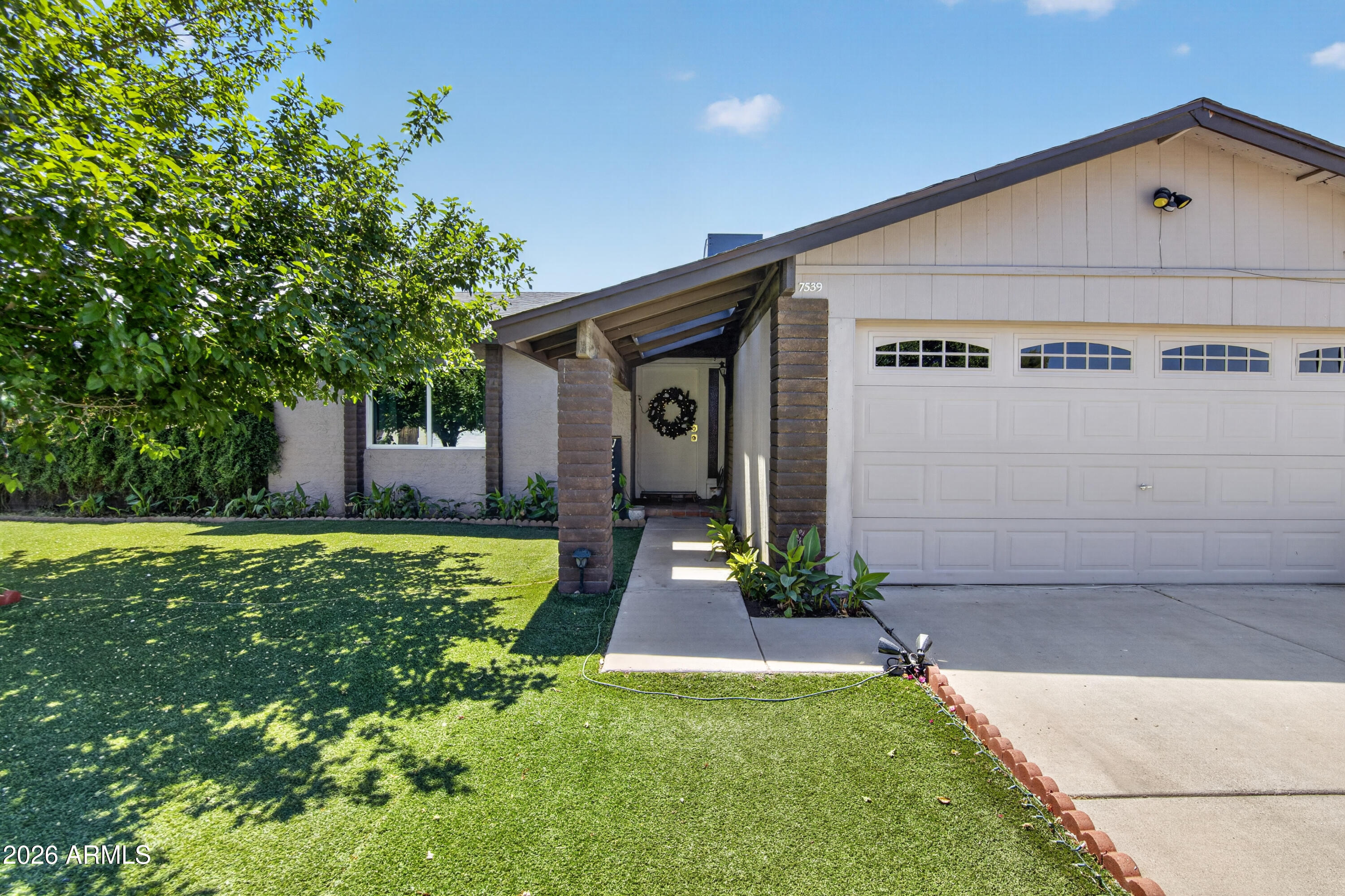 7539 W HIGHLAND Avenue