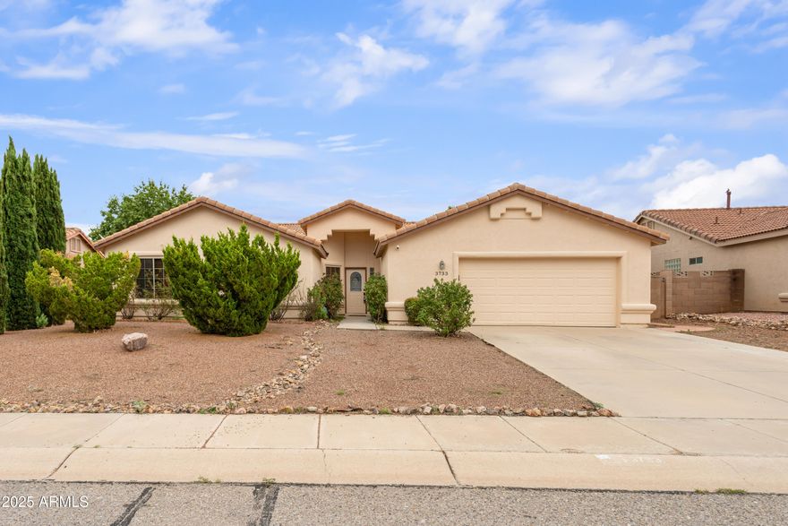 This fantastic 4 bedroom and 2.5 bathroom house located in the highly desired subdivision of Canyon De Flores is ready to be called HOME. Interior has space for your needs with 2 living spaces and a large open kitchen equipped with an island and stainless appliances. Half bathroom is located centrally to living spaces and kitchen making this ideal for entertaining and gatherings. Fireplace in main living room. Primary bedroom has ensuite that allows for you to escape in the soaker tub, shower stall is separate and there are 2 sink vanity. Outside space is not limited on this property with a covered patio and different areas to help you enjoy your backyard