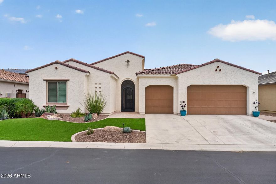 Located on one of the most picturesque streets in the award-winning PebbleCreek active adult resort community, this highly sought-after Solstice model delivers luxury living with no wait to build. Completed in 2022, this exceptional home showcases soaring ceilings, expansive open-concept living, spacious bedrooms, a versatile den, and designer upgrades throughout, including Hunter Douglas PowerView automated shades and dramatic floor-to-ceiling pocket doors that create seamless indoor/outdoor living.

At the heart of the home, the chef-inspired kitchen impresses with rich cabinetry, quartz countertops, oversized island with breakfast bar, gas cooktop, stainless steel appliances, beverage refrigerator, butler's pantry, and an expansive walk-in pantry. Flexible den and bonus spaces provide ideal options for a home office, media room, hobby space, or private retreat, while the formal dining area is surrounded by windows overlooking the spectacular backyard oasis.

Designed for both entertaining and relaxation, the resort-style backyard features a sparkling pool with modern technology and multiple water features, custom landscape lighting, built-in barbecue, artificial turf, citrus trees, view fencing, and an expansive covered patio with canned lighting and generous space for outdoor dining and lounging beneath Arizona's breathtaking sunsets.

Adding exceptional value, the home includes solar for enhanced energy efficiency, potential utility savings, and year-round comfort during Arizona's warm summers. A spacious 3-car garage offers abundant room for vehicles, golf carts, storage, and recreational gear.

Enjoy the unmatched lifestyle of PebbleCreek with championship golf, pickleball, tennis, bocce, resort-style pools, state-of-the-art fitness centers, creative arts studios, performing arts theater, restaurants, clubs, and endless social activities. After a day enjoying the community's world-class amenities, retreat to the elegant primary suite and welcoming guest accommodations designed for comfort and privacy.

Additional upgrades include high-end window coverings, custom ornate security screen door, and an Earthsmarte water treatment system. This exceptional residence combines modern luxury, thoughtful design, energy-conscious living, and the vibrant lifestyle of one of Arizona's premier guard-gated 55+ communities.