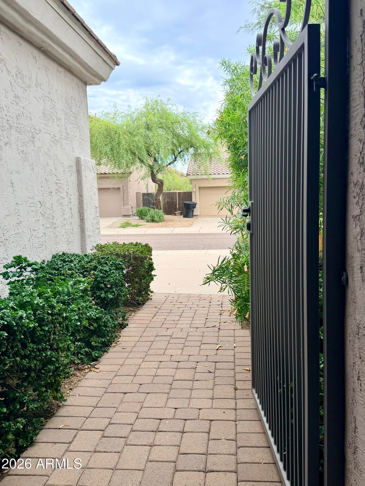 7228 E WHISTLING WIND Way
