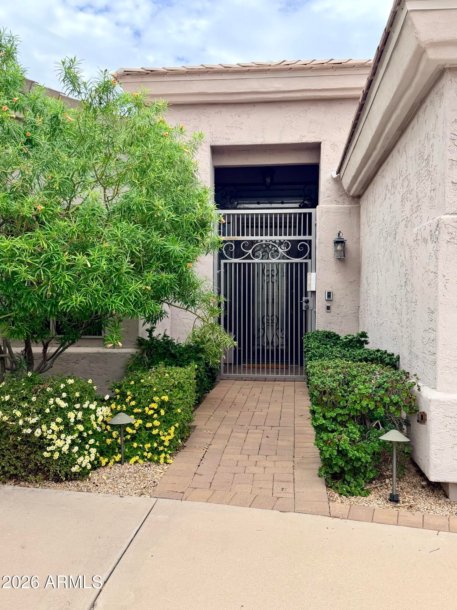 7228 E WHISTLING WIND Way
