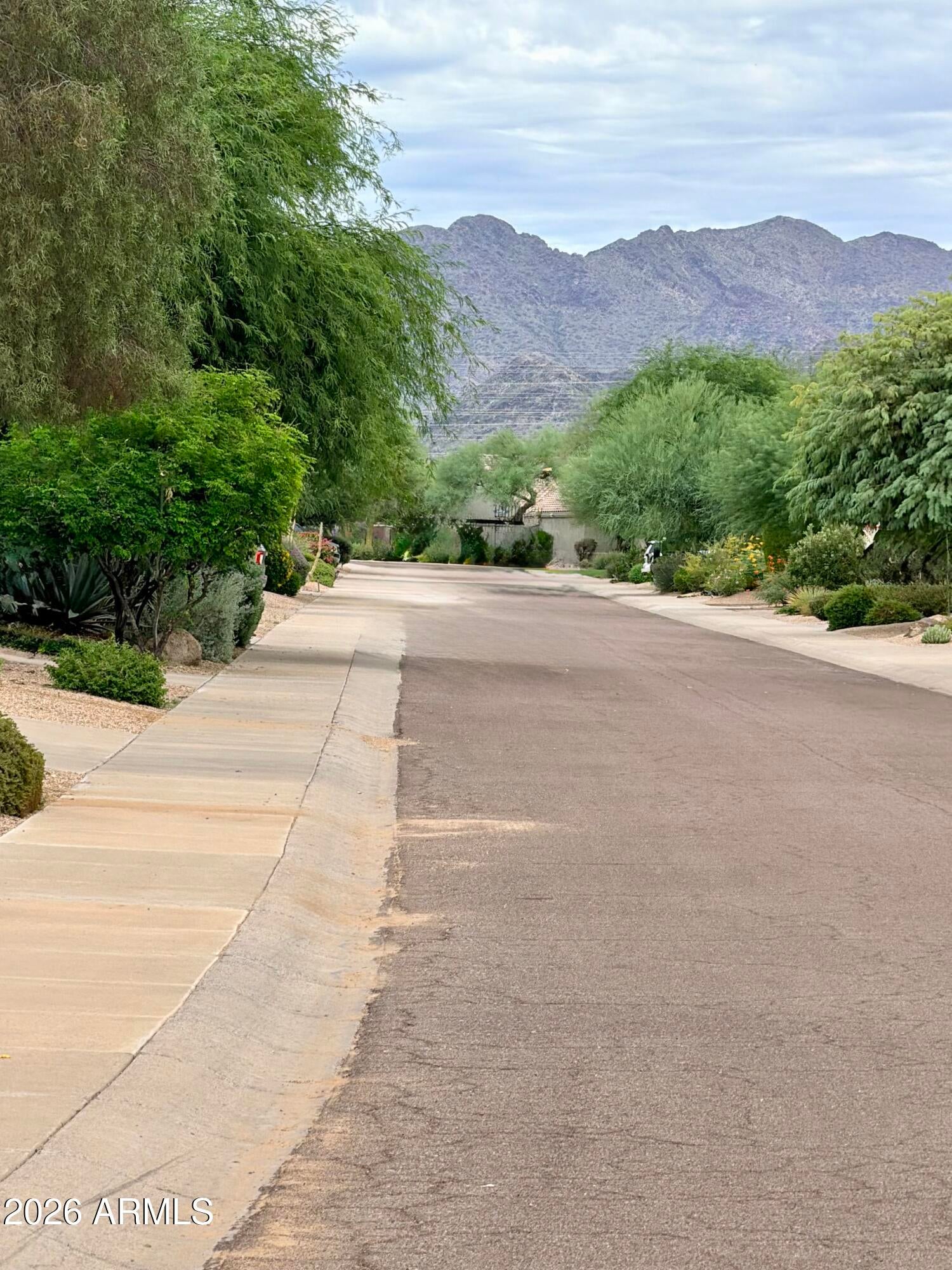7228 E WHISTLING WIND Way
