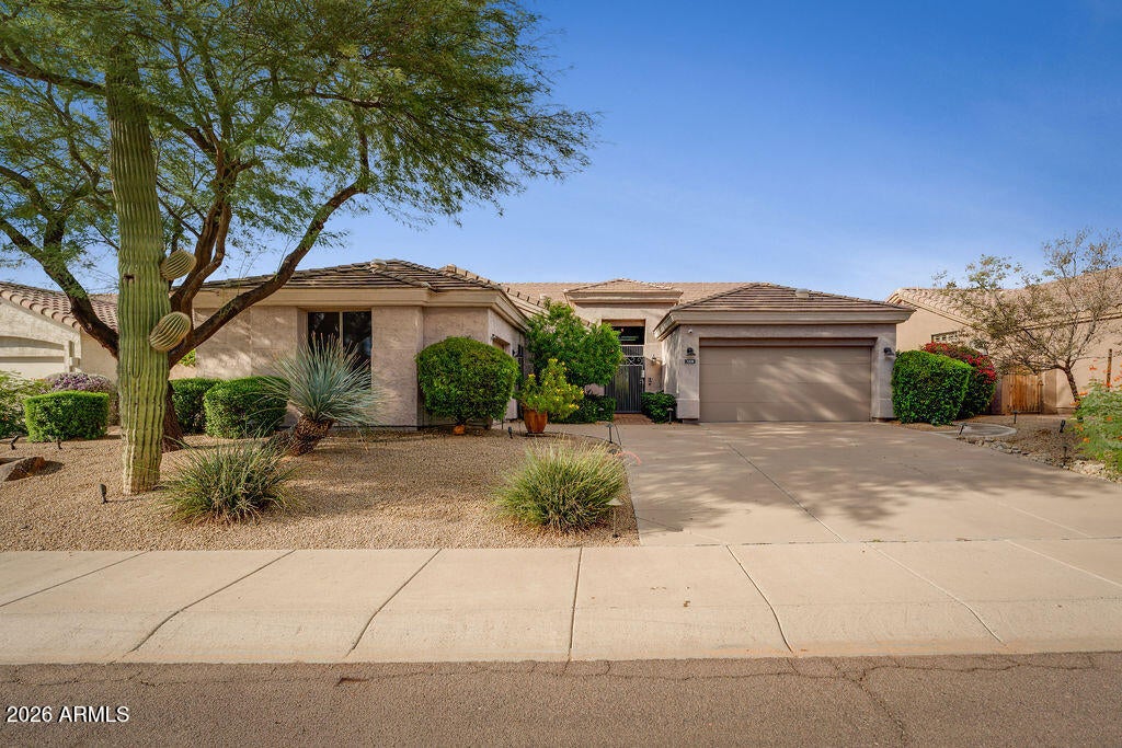 7228 E WHISTLING WIND Way