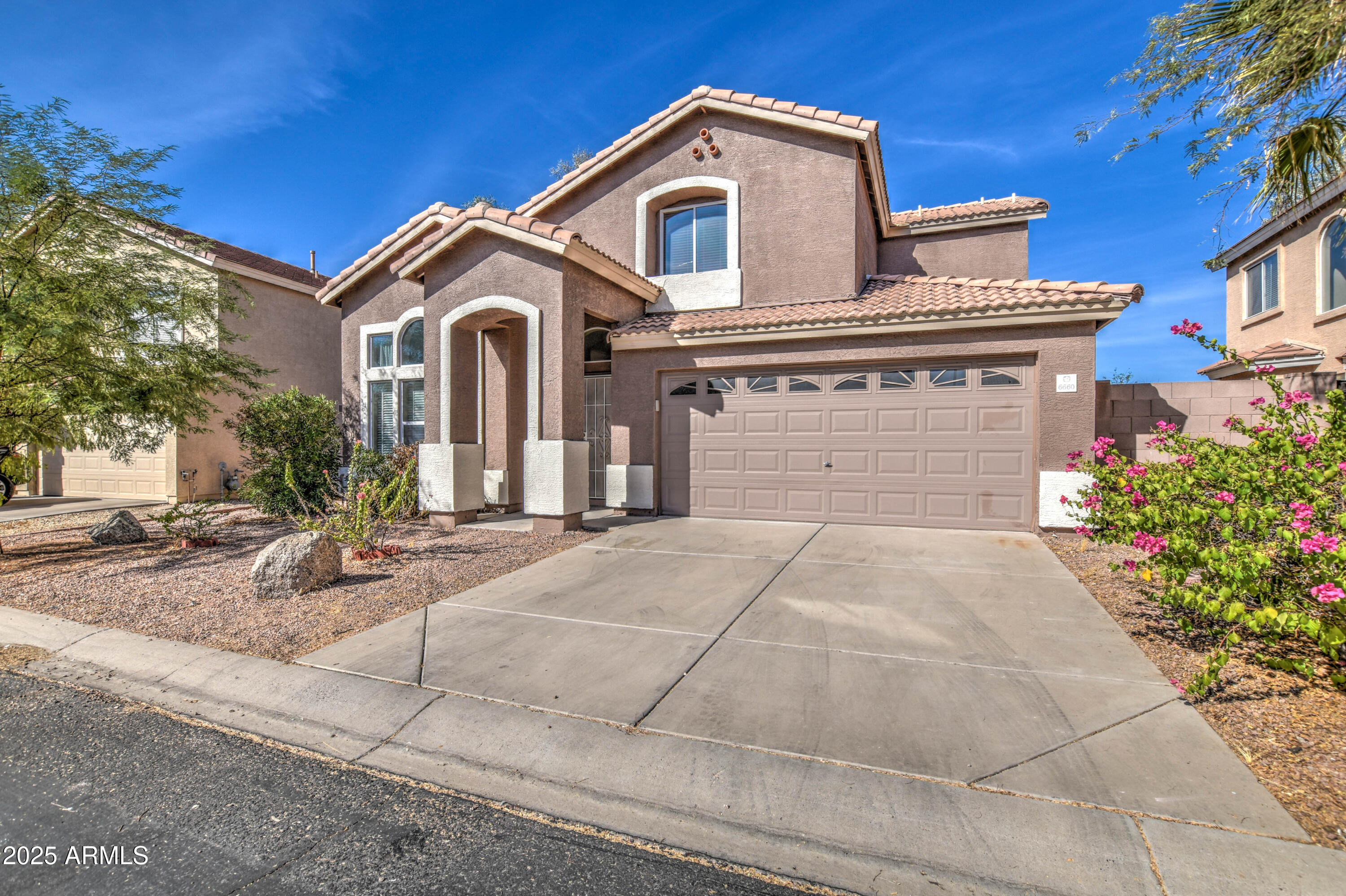 6660 E RIVERDALE Street