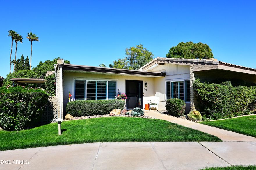 Welcome  to this updated townhome with a great  room floor plan and abundant natural light   The refrigerator is 2024, stove, microwave and water heater were new last year, farmers sink, quartz kitchen counter-tops, custom closet with a barn door in master bedroom, custom remote control  shades on patio door.  Walking distance to the clubhouse with full restaurant and bar, hair salon, aesthetician, massages and nail salons, workout room, community pool and spa. This hidden gem with 24 hour security is walking distance to Fashion Square, old town restaurants and entertainment.