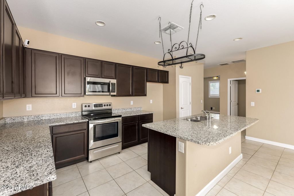 Photo of 2005 S 236th Lane, Buckeye, AZ 85326 (MLS # 6988001)