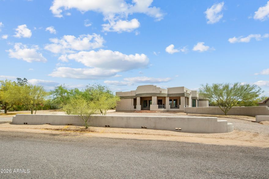 An extraordinary desert estate tucked away in Cave Creek, where timeless Southwest architecture meets expansive living and unmatched versatility. Set on a sprawling homesite, this one-of-a-kind residence offers 2 ensuite bedrooms and 7 bathrooms, complemented by several additional bonus spaces that provide limitless potential for a private office, wellness retreat, art studio - you name it! 

From the moment you enter, the home's character is undeniable--rich Saltillo tile floors flow throughout, grounding the space in warmth and authenticity, while the unique floorplan creates a blend of intimate living and grand-scale entertaining. The outdoor experience is nothing short of exceptional. An expansive covered patio invites year-round enjoyment, overlooking a resort-style pool and vast desert landscape that captures the quiet beauty and privacy that define Cave Creek living. With open skies, natural desert vegetation, and room to create your own vision, this property offers a rare sense of freedom and escape.

New interior paint, new roof and new windows in 2026! 

Designed for those who value space, character, and the ability to live beyond traditional boundaries, this estate is more than a home--it's a lifestyle.