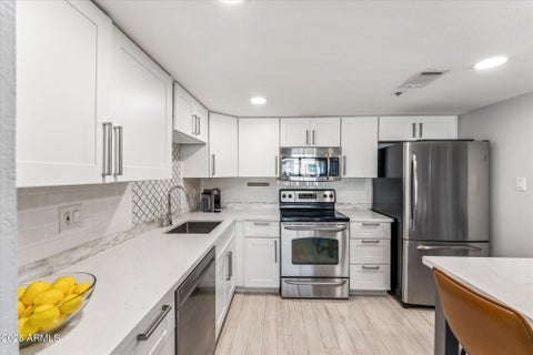 Photo of 7950 E Camelback Road #704, Scottsdale, AZ 85251 (MLS # 7079689)